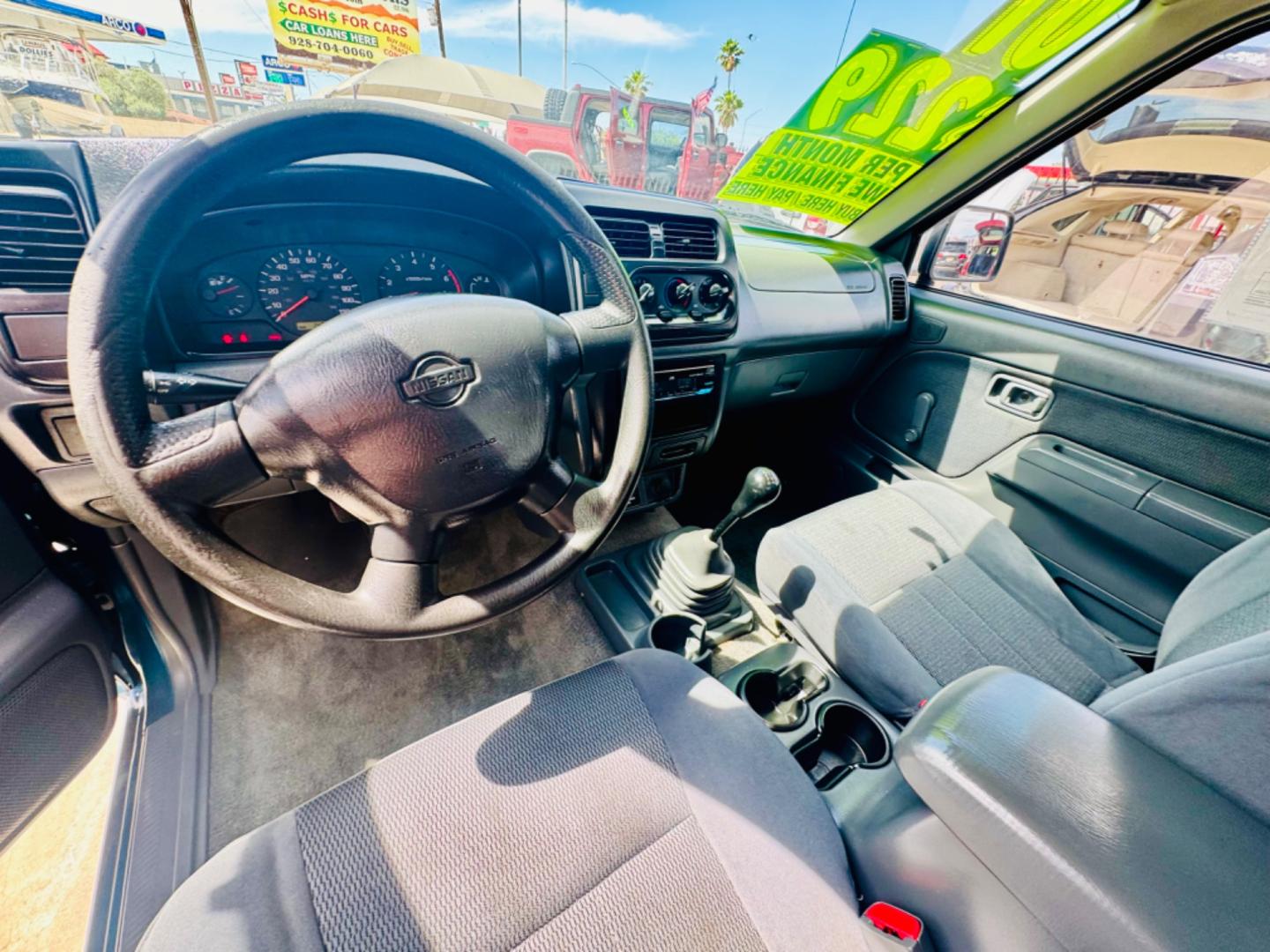 2001 Blue Nissan Frontier (1N6DD26S41C) , located at 2190 Hwy 95, Bullhead City, AZ, 86442, (928) 704-0060, 0.000000, 0.000000 - 2001 Nissan frontier xe king cab. 4 cylinder. 142k miles. Manual . Ice cold ac. Lots of extras done to truck . New tires new radiator. Fully serviced. New clutch, new brakes, pads. Runs and drives great. Financing available. In house financing .buy here pay here - Photo#12